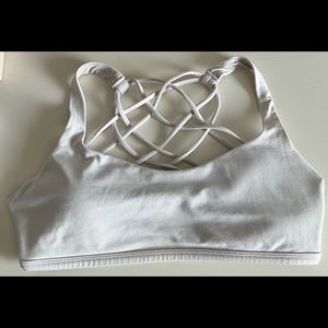 Light pink Lululemon free to be wild sports bra size 8